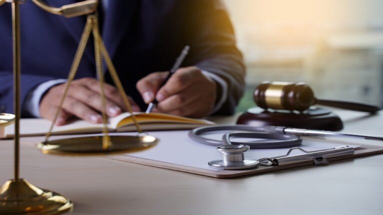 judge gavel and medical equipment